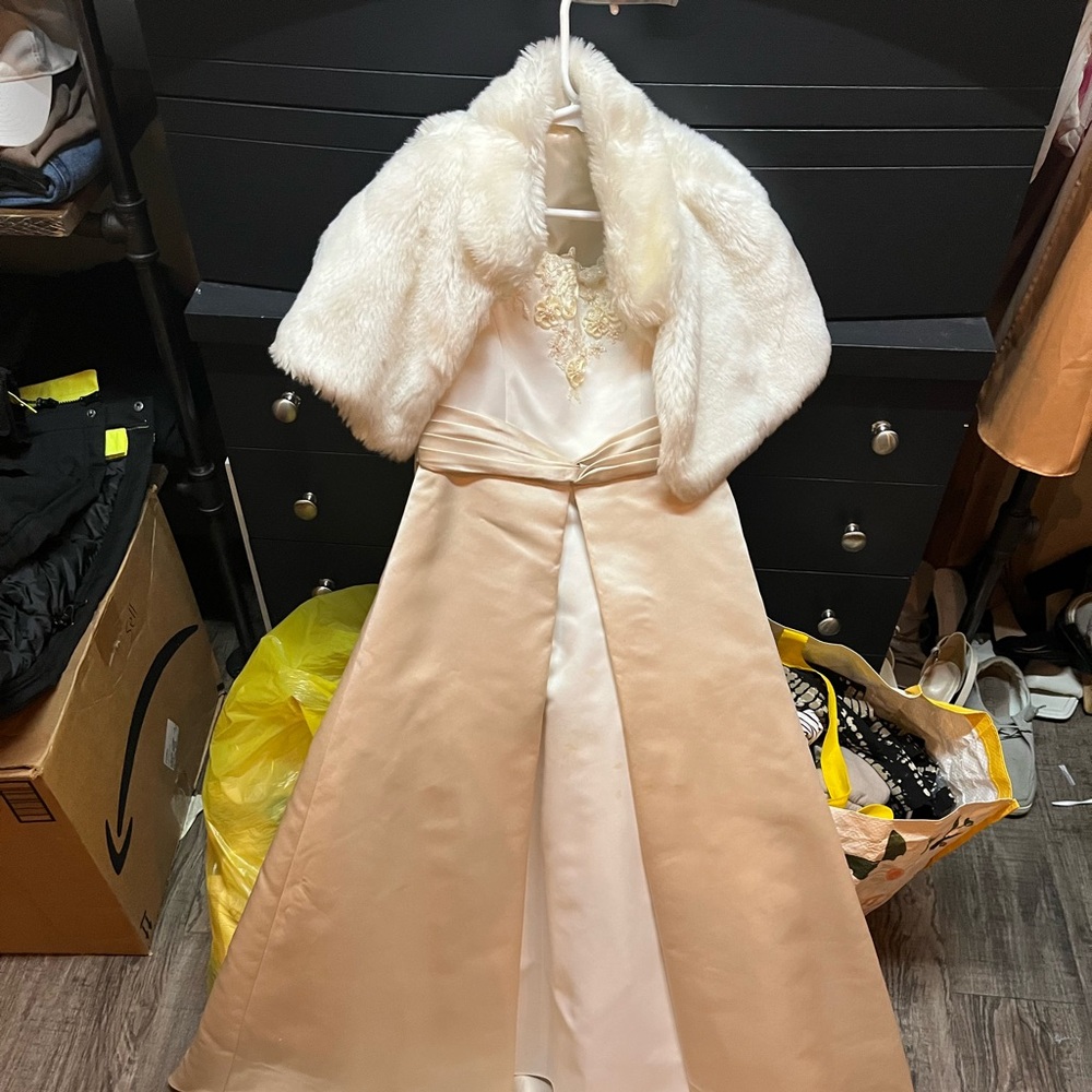 Kids David’s Bridal 5/6 white with small train and fur shall.